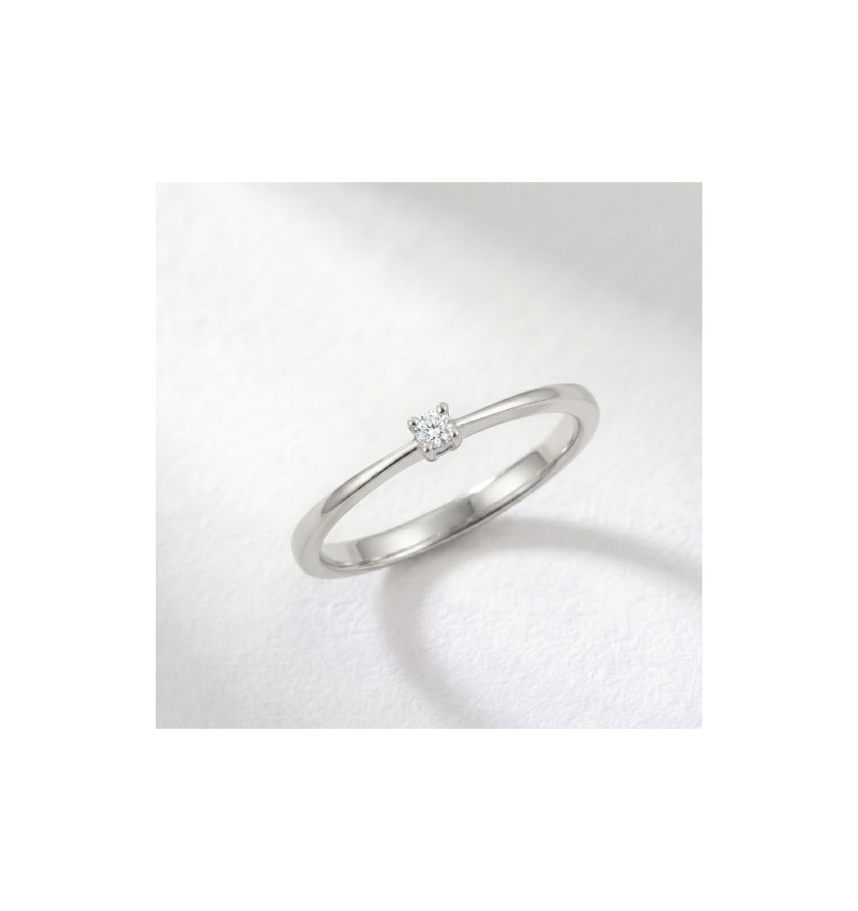 Anillo de compromiso 4 garras en oro 18kts y diamante natural