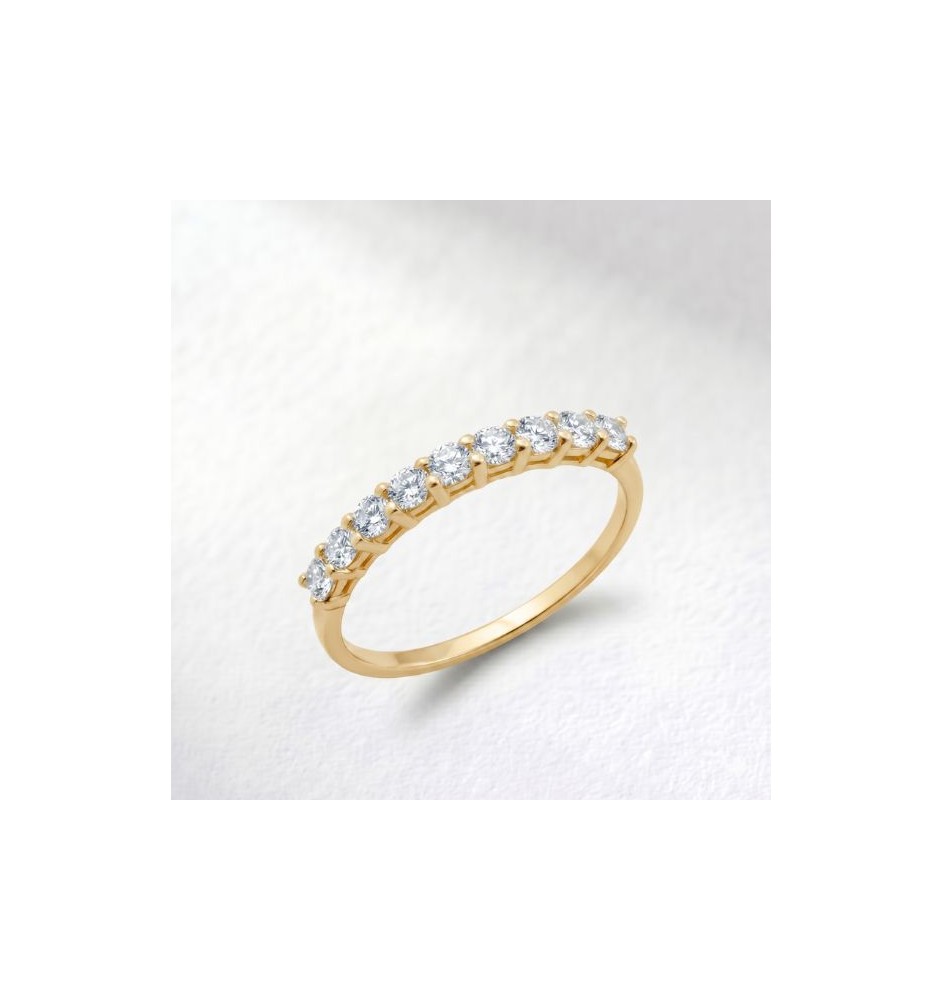 Anillo media alianza en oro 18kts y diamantes naturales 9531