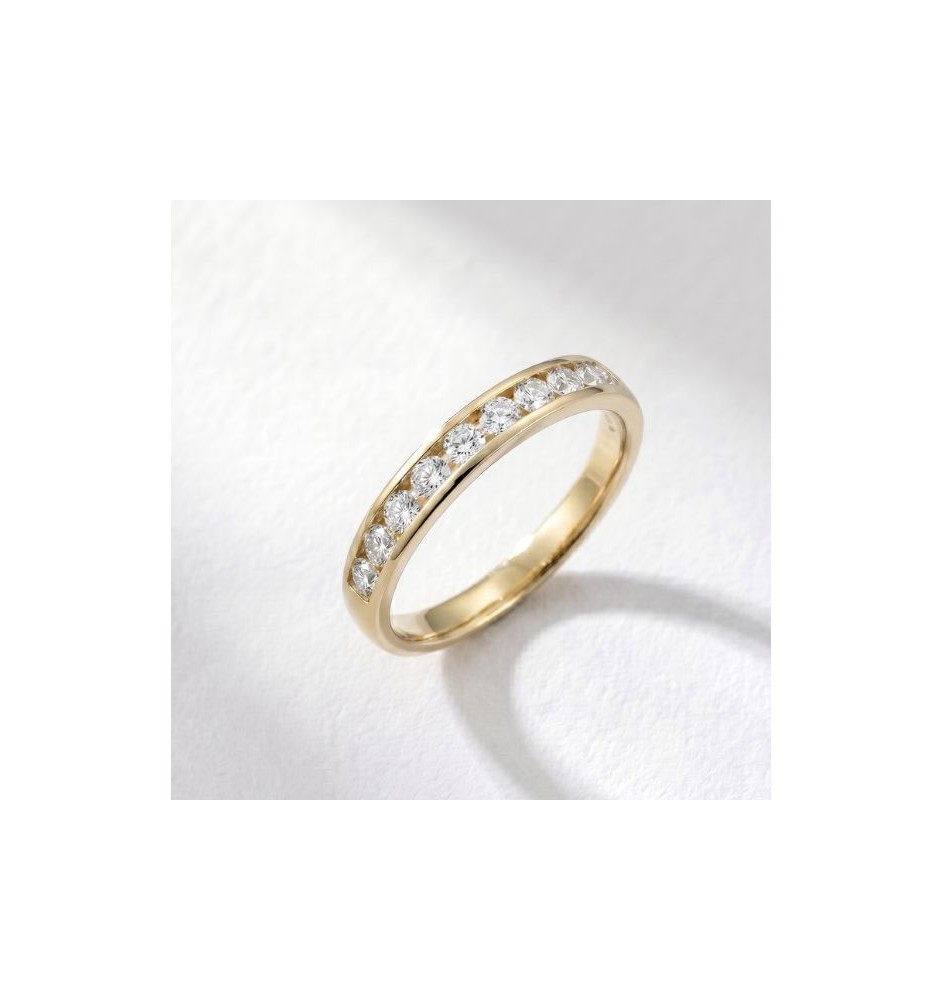 Anillo media alianza en oro 18kts y diamantes naturales 805/05