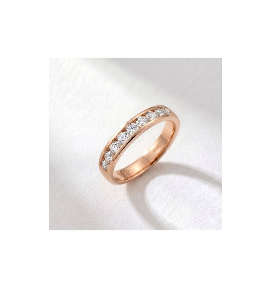 Anillo media alianza en oro 18kts y diamantes naturales 805/06
