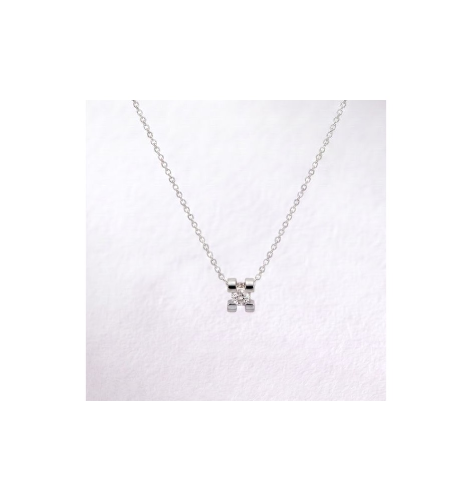 Colgante oro blanco 18kts con diamante 4 garras