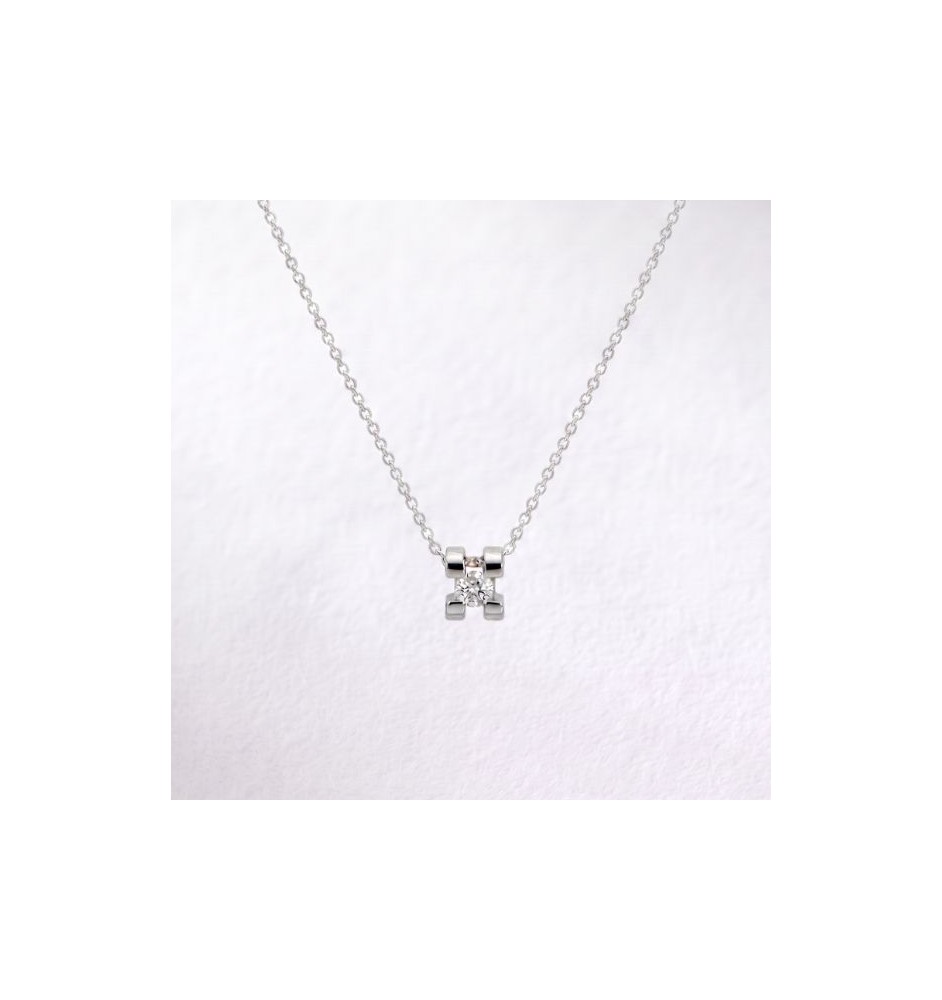 Colgante oro blanco 18kts con diamante 4 garras