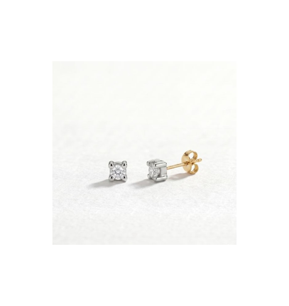 Pendientes solitario 4 garras en oro 18kts y diamante natural 70/1
